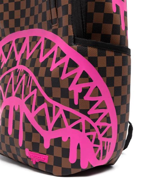 sprayground backpack logo check.